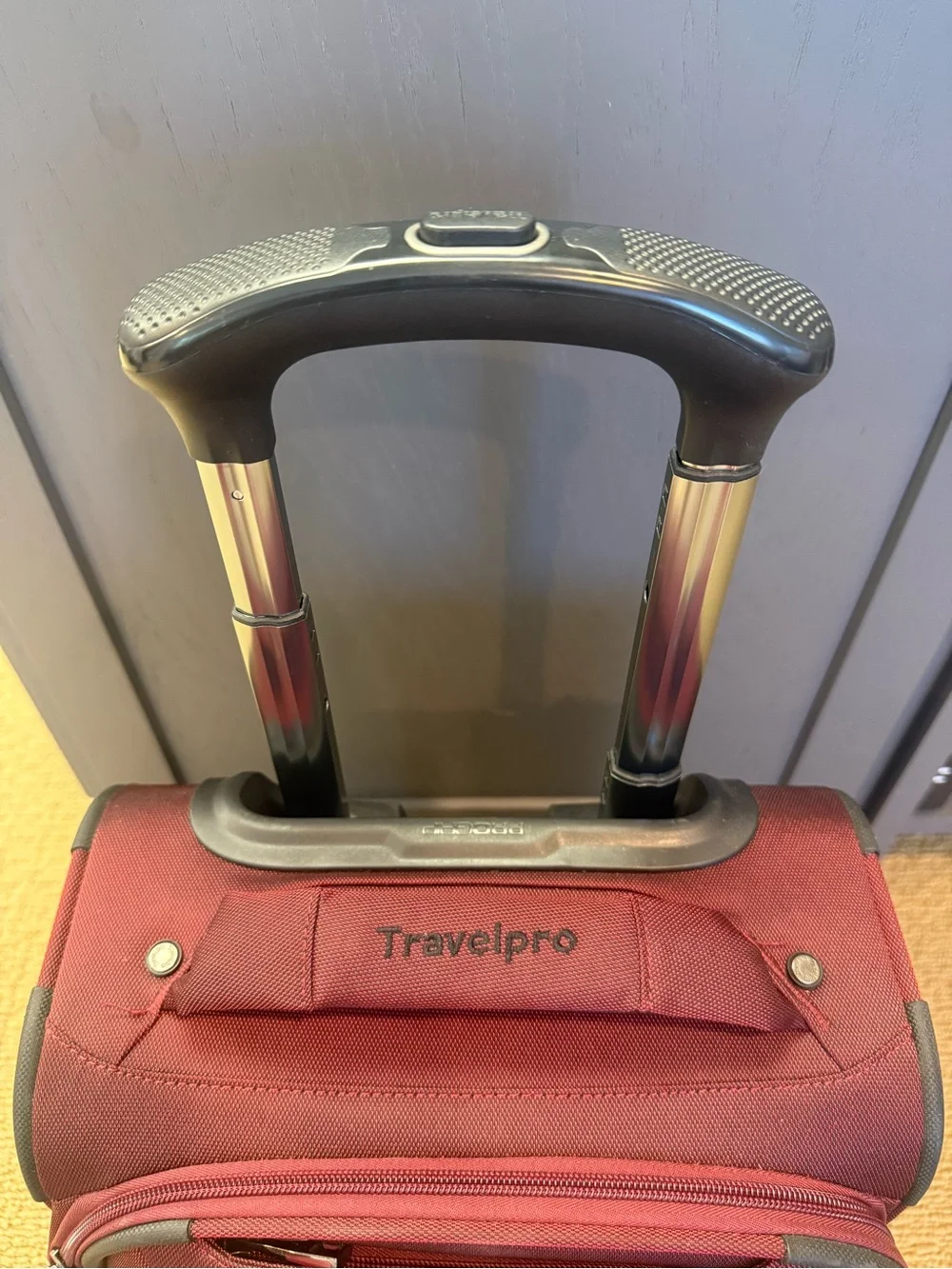TravelPro Red Carry-On Spinner Bag Luggage